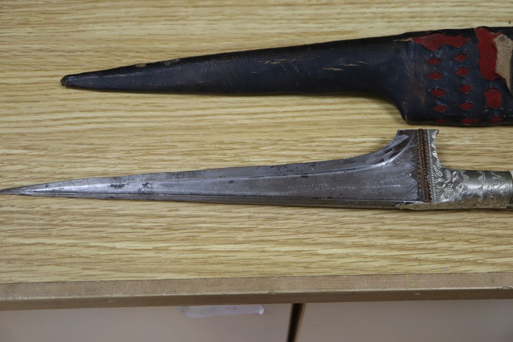 A 19th century Eastern bone handled dagger, length excluding scabbard 34.5cm